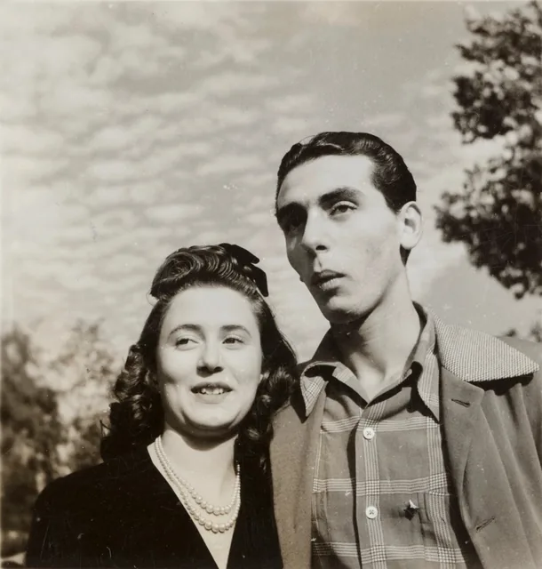 A real scanned 1940s black-and-white photo of a young couple